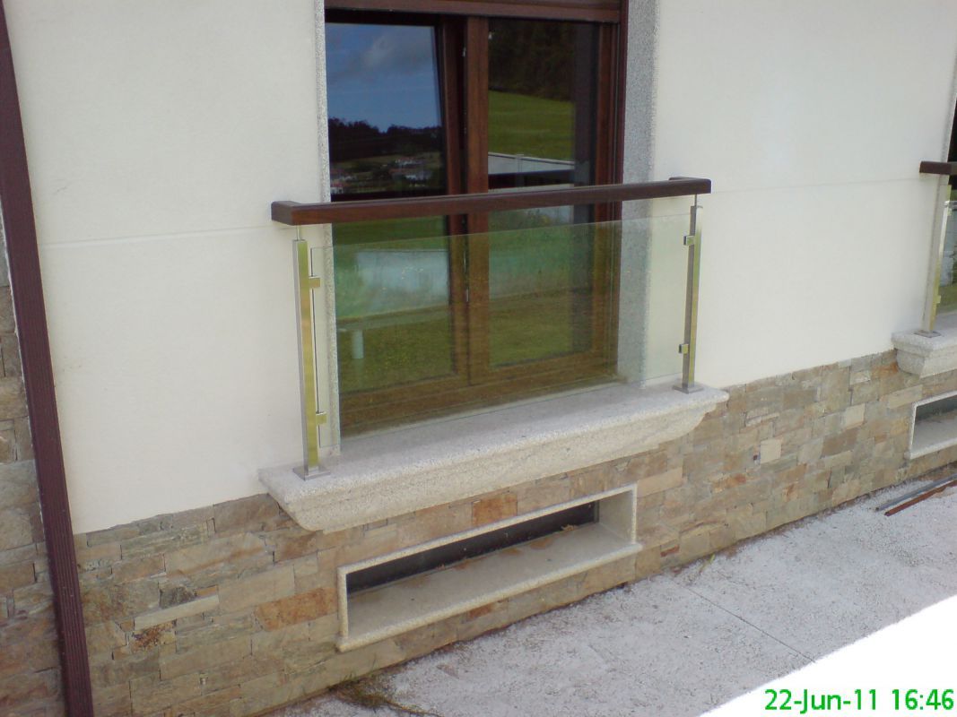 Terraza con frontal de vidrio